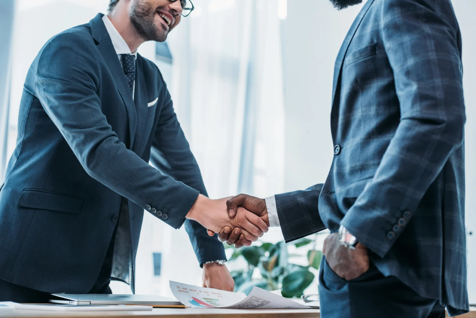 cropped-image-of-smiling-multicultural-businessmen-2023-11-27-05-01-28-utc